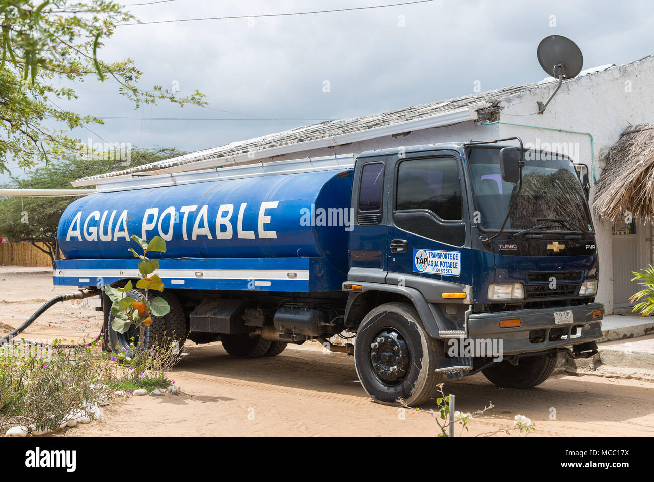 Truck delivers potable water to residents in rural area. Colombia, South America. Stock Photo