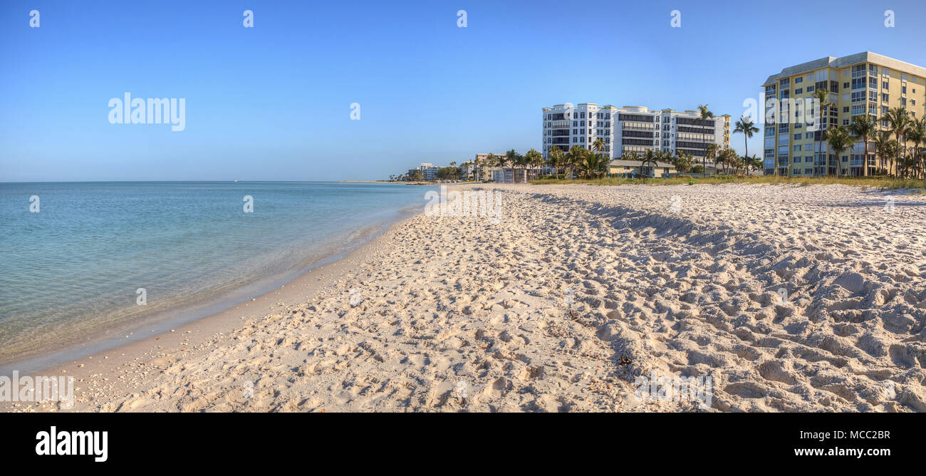 Clear blue sky over Lowdermilk Beach in Naples, Florida Stock Photo Alamy