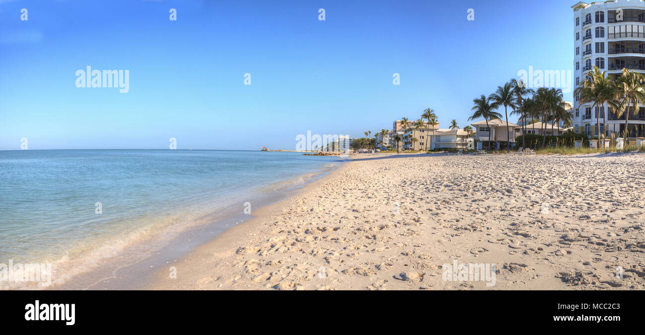 Clear blue sky over Lowdermilk Beach in Naples, Florida Stock Photo Alamy