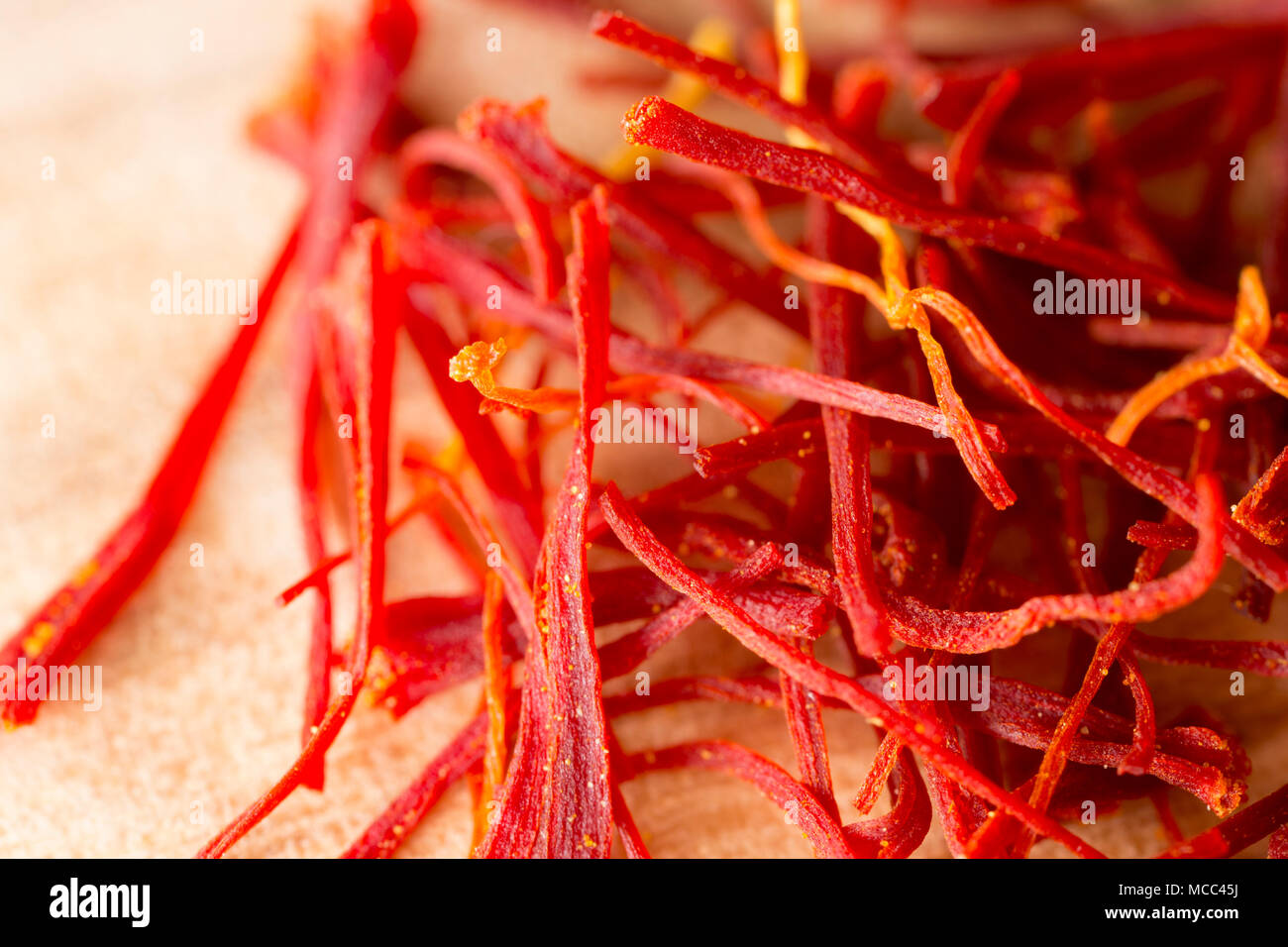 Saffron threads bought from a supermarket in the UK. Saffron is the stigmas and styles of the saffron crocus Crocus sativus, and is an expensive spice Stock Photo