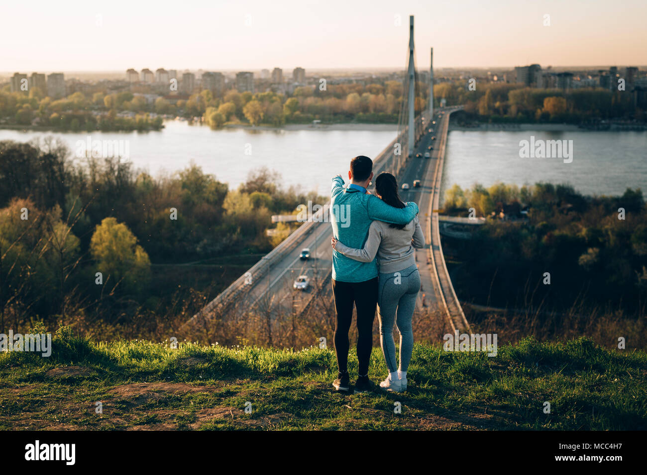 Happy young sporty couple sharing romantic moments Stock Photo - Alamy