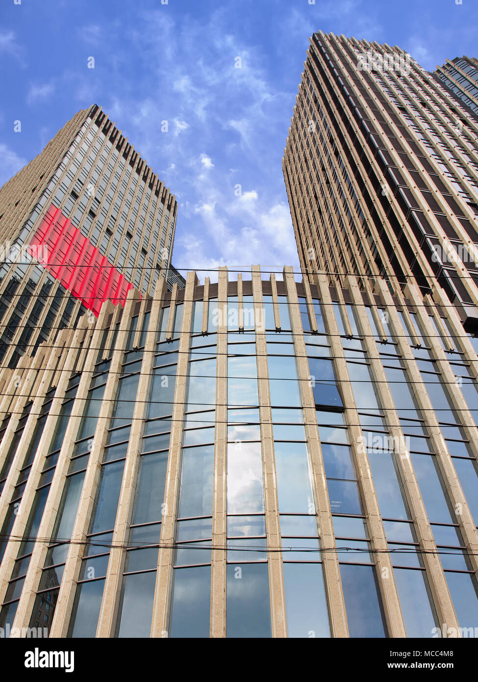 Massive office buildings with reflection in the glass surface, Shanghai, China Stock Photo