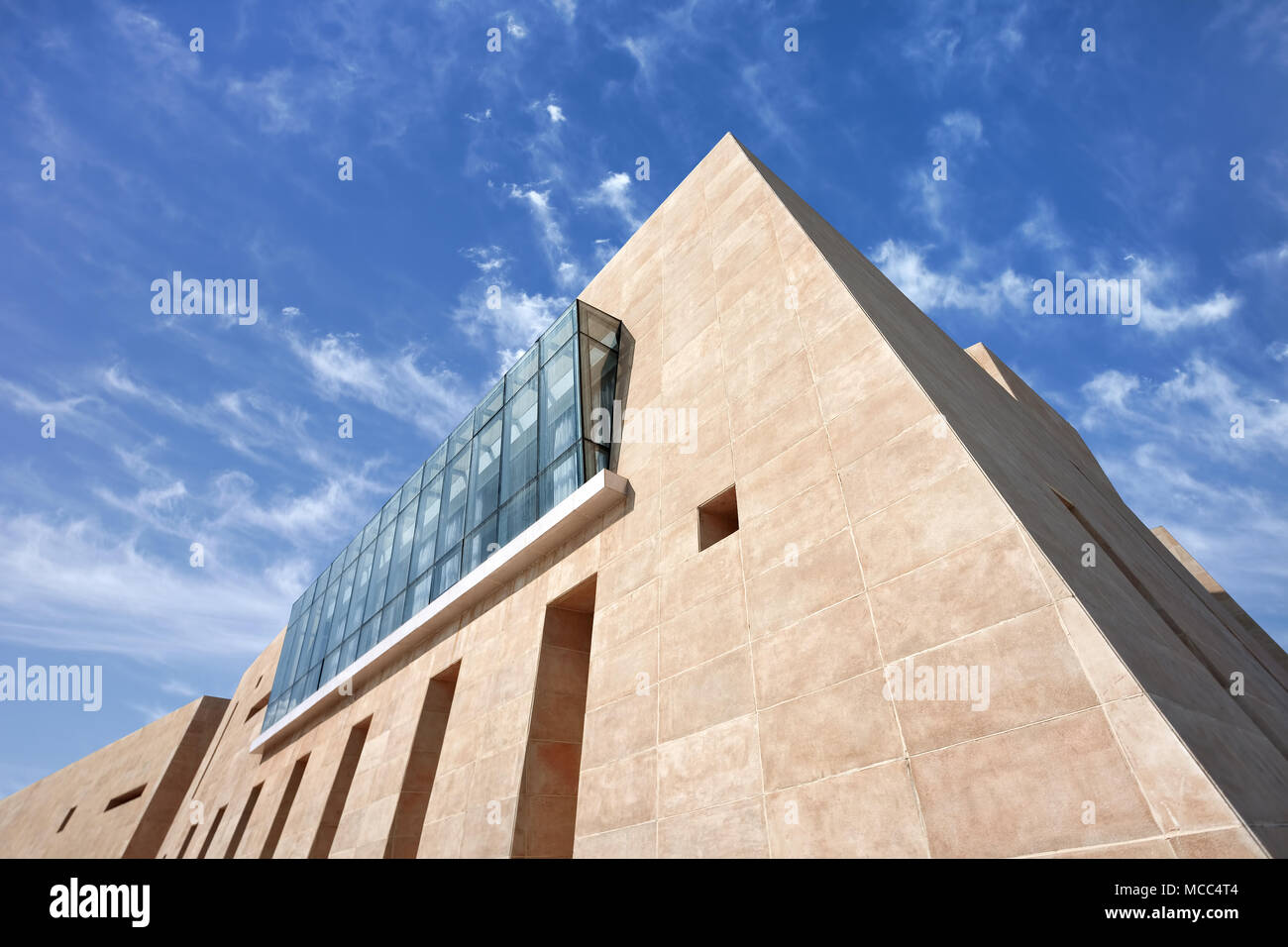 Modern architecture against a blue sky with dramatic clouds Stock Photo ...