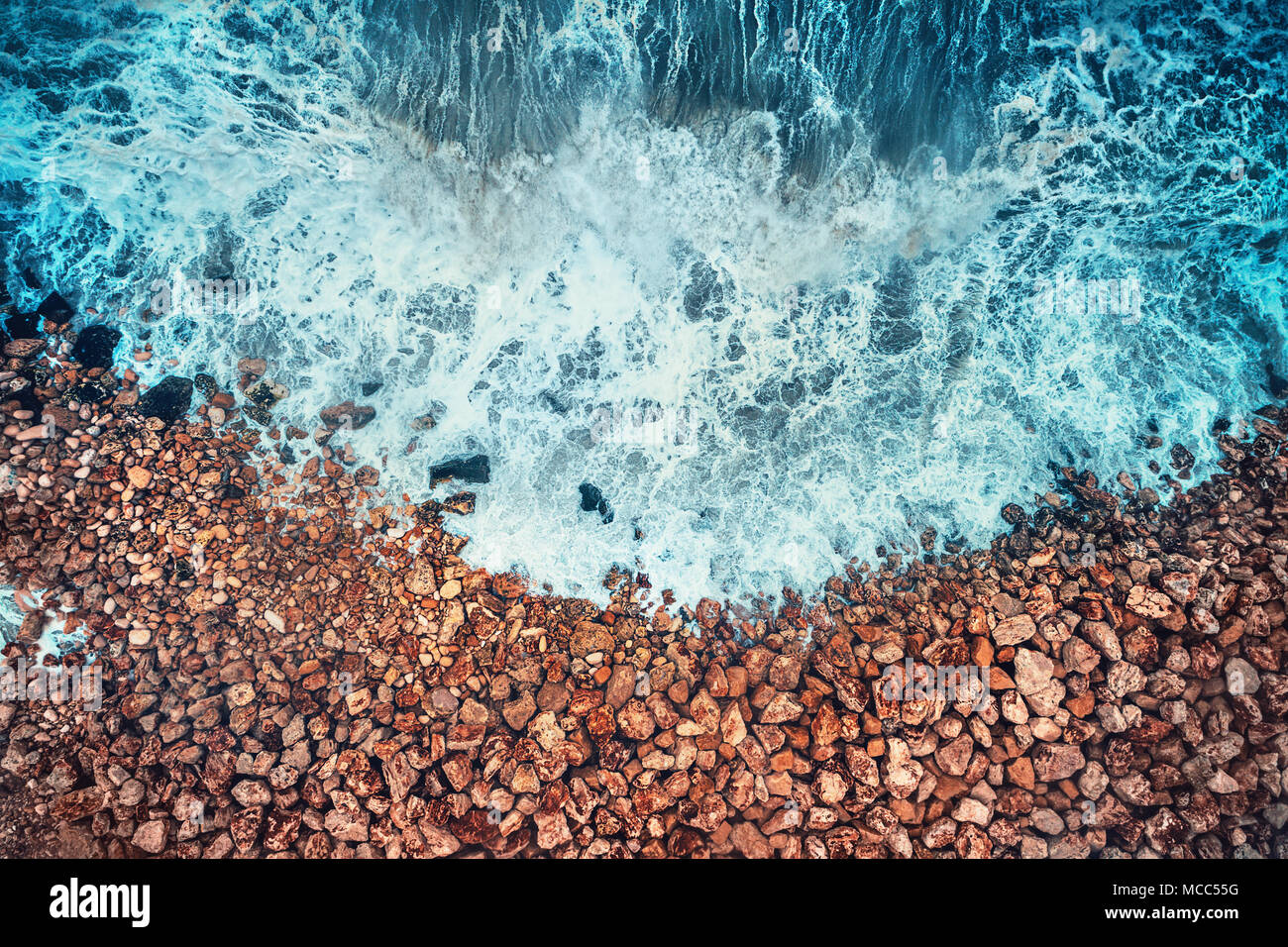 Aerial view of sea waves and rocky coast Stock Photo - Alamy