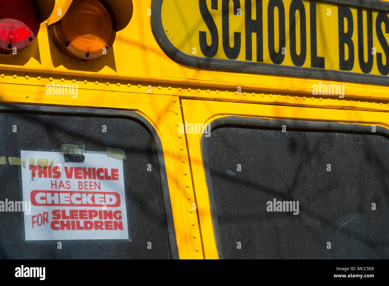 This New York City school-bus has been checked for sleeping children, April 2018 Stock Photo