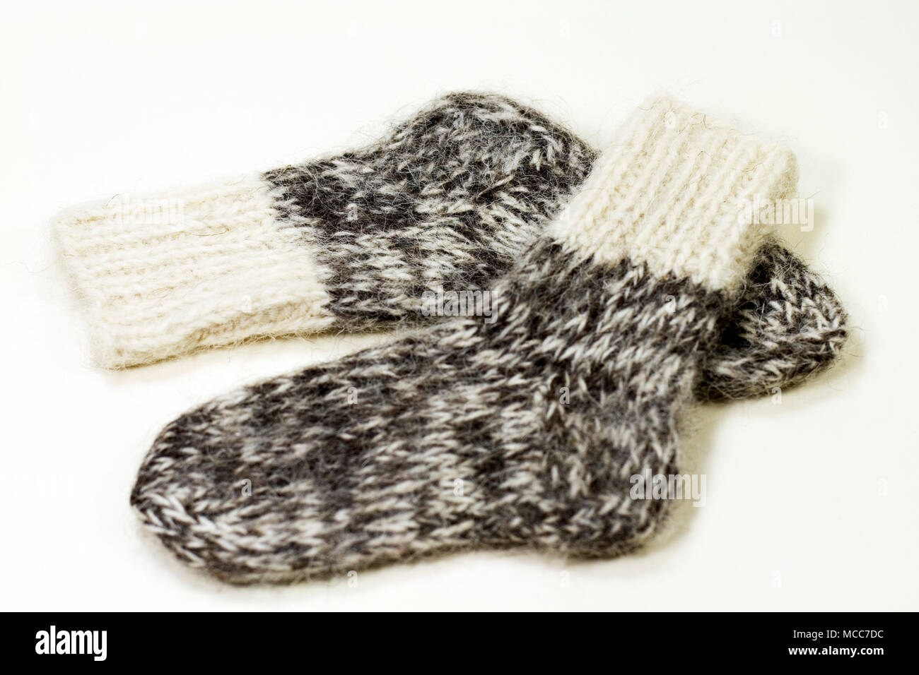 two grey wool knitted socks Stock Photo