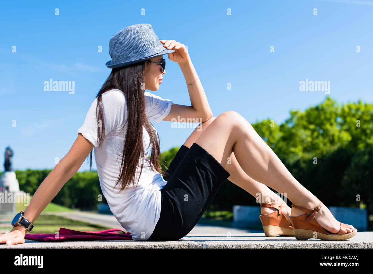 Young Asian woman smiling in the park Stock Photo - Alamy