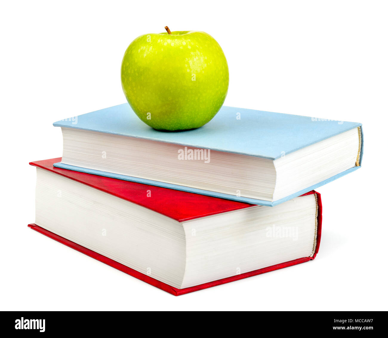 books and apple isolated on white background Stock Photo - Alamy