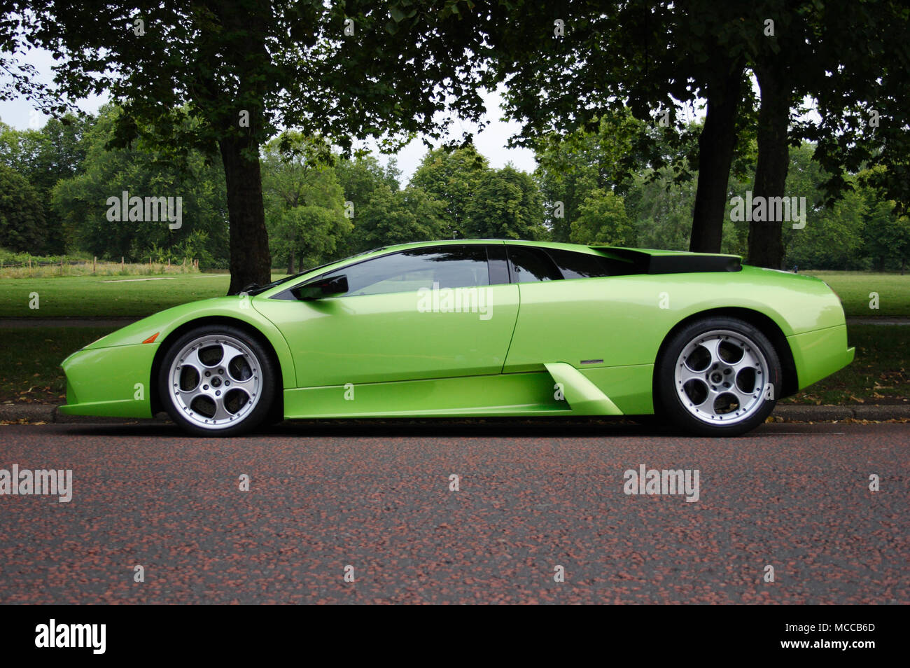 Lime green Lamborghini Murcielago supercar or hypercar in profile (side view) Stock Photo