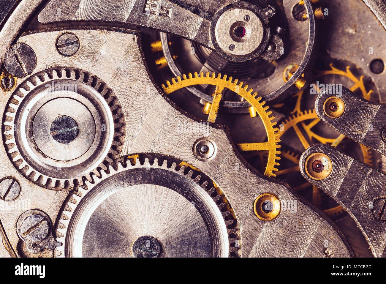 Clockwork Background. CloseUp Of Old Clock Watch Mechanism. Retro