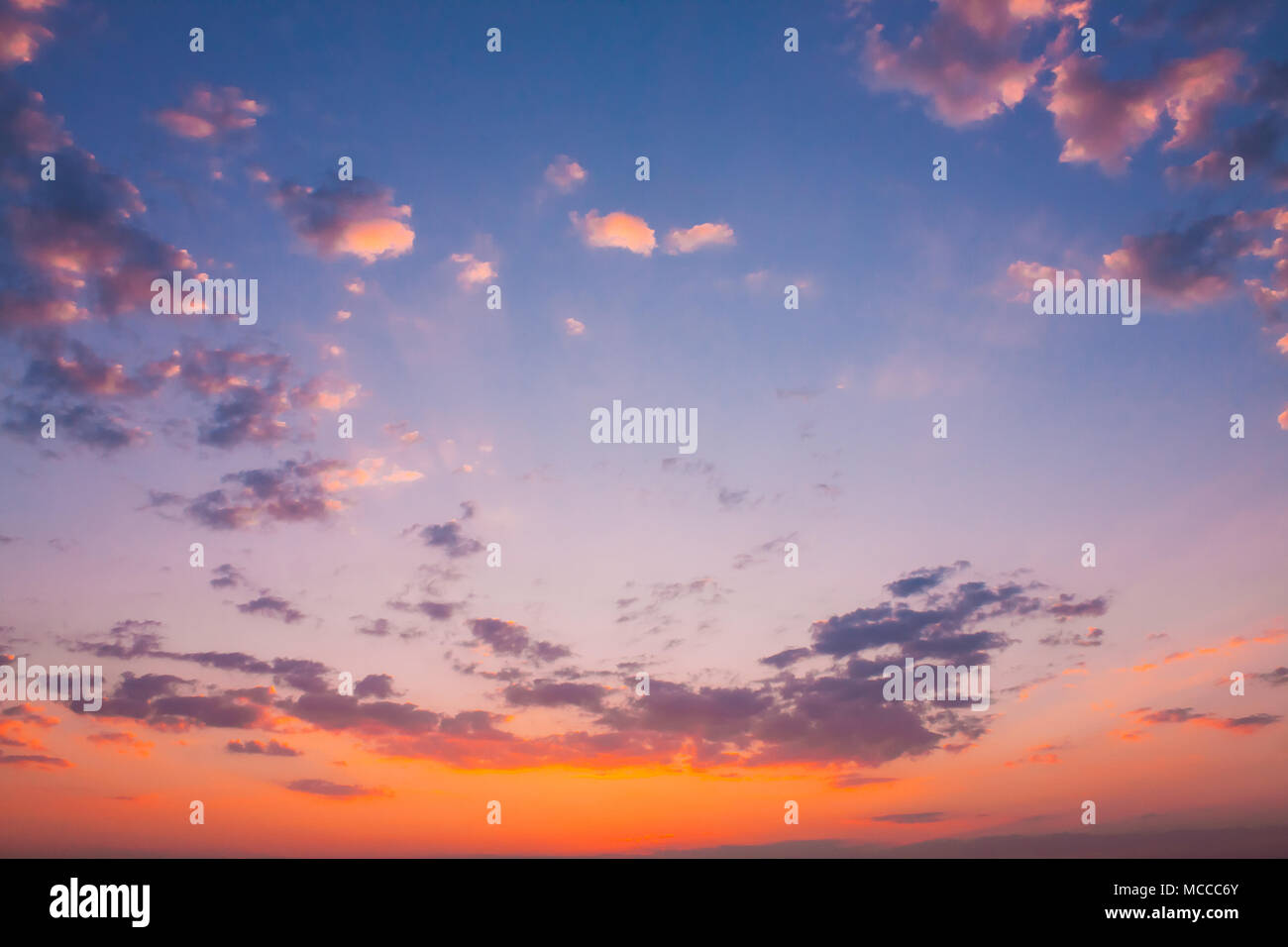 Sunset Sunrise Sky Background. Natural Bright Dramatic Sky In Sunset Dawn Sunrise. Yellow And Pink Colors Stock Photo