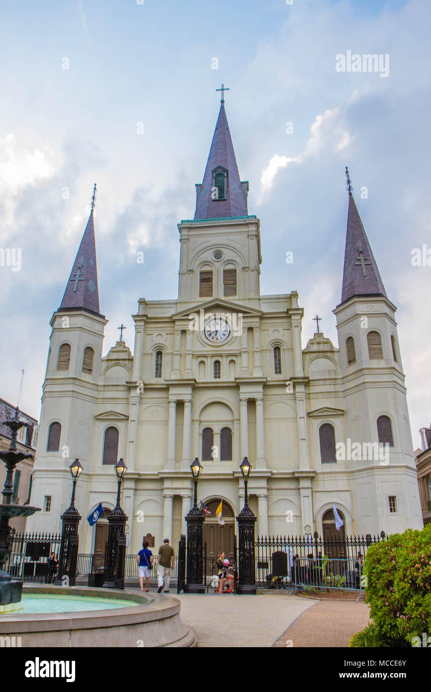 St. Louis Cathedral, Jackson Square, Louisiana, United States. Color vertical image with fountain and people and foreground. Stock Photo