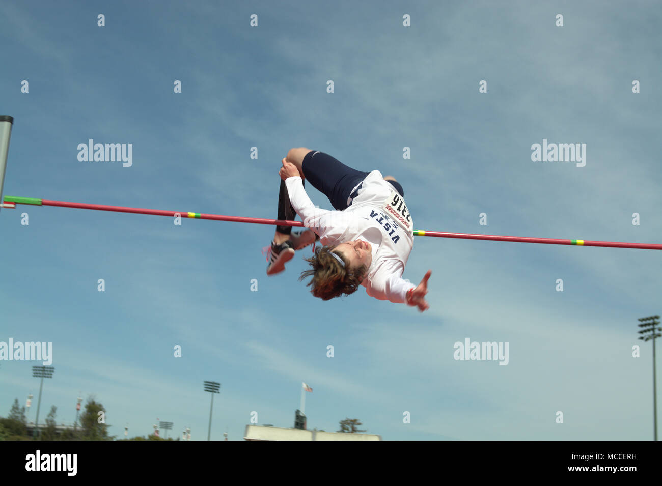 Jake Grimsman clears 2.21m (7'3') to win the high school boys high jump competition during the 2018 Stanford Invitational track meet. Stock Photo