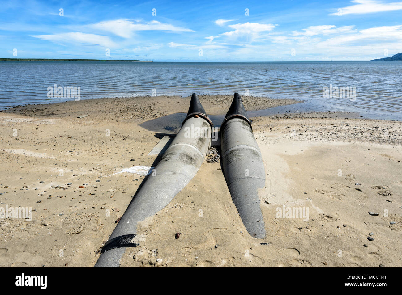 Drains for storm water discharge on Cairns beach, Far North Queensland, FNQ, QLD, Australia Stock Photo