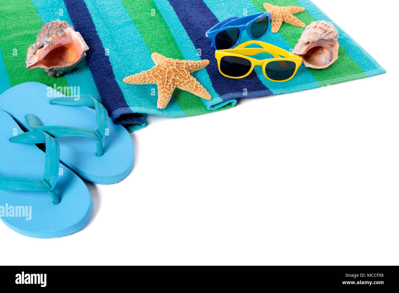 Flip flops and summer beach objects isolated on white background Stock ...
