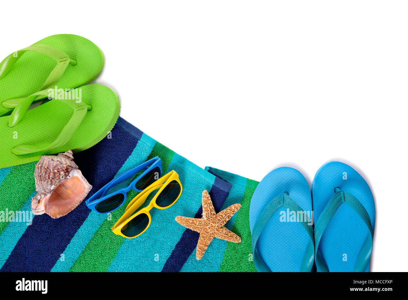 Flip flops and summer beach objects isolated on white background Stock ...