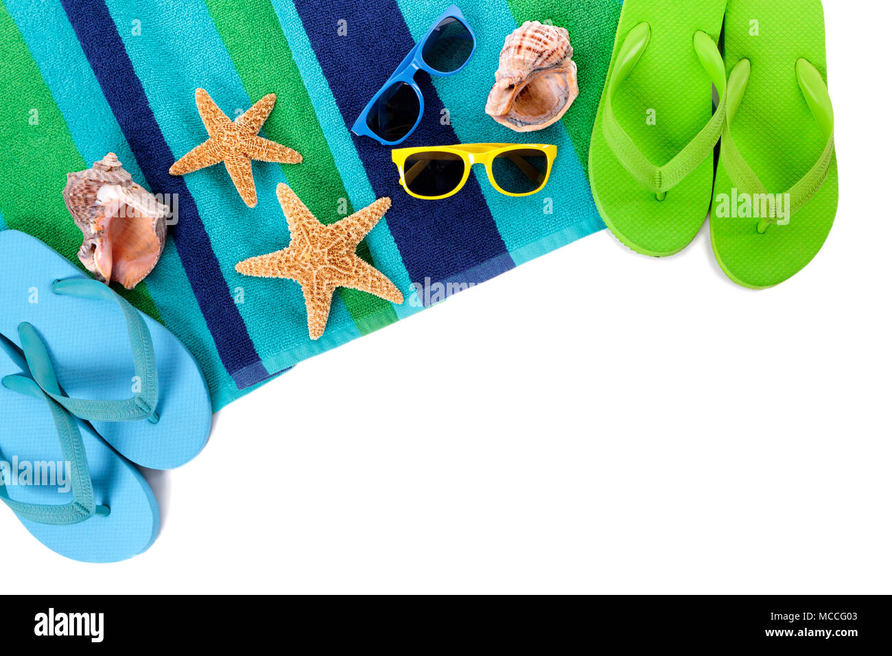 Flip flops and summer beach objects isolated on white background Stock ...