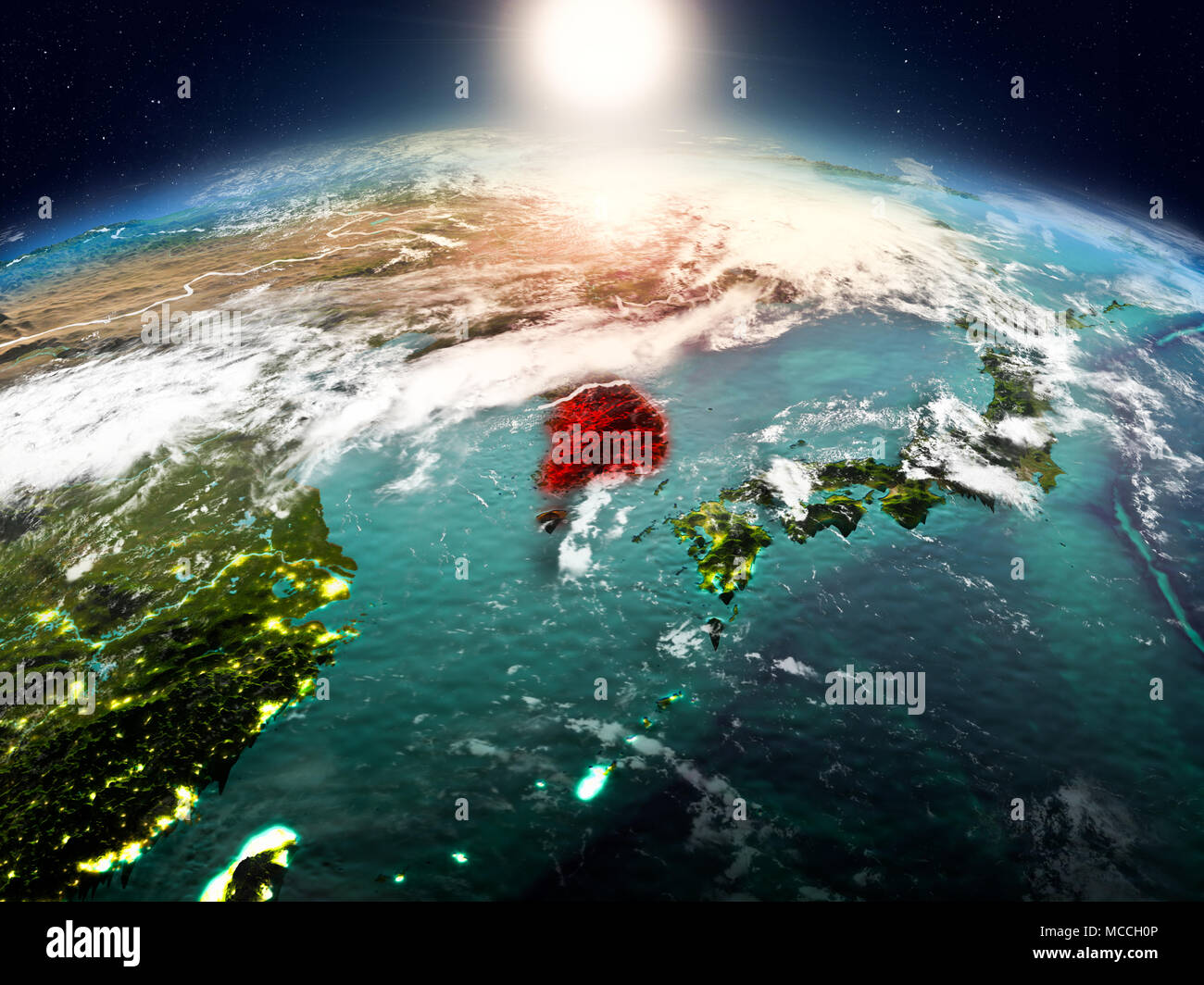 Sunrise above South Korea highlighted in red on model of planet Earth ...