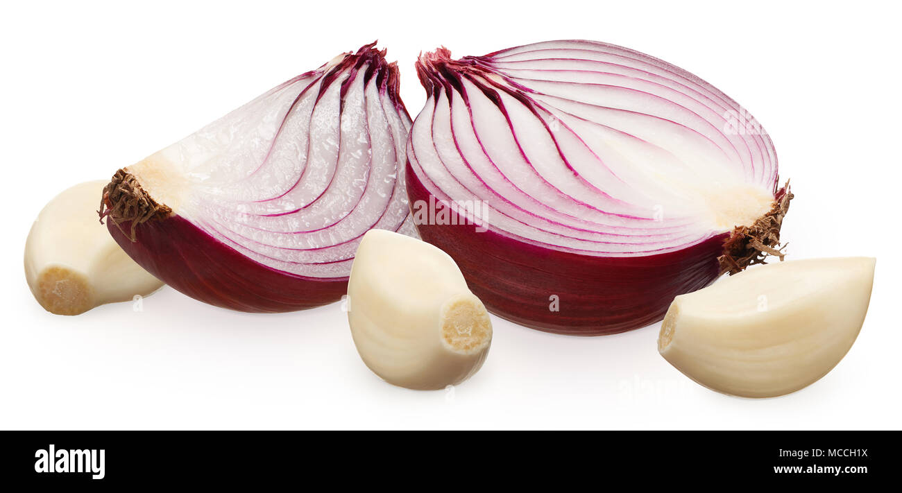 Half and slice of fresh unpeeled red onion and three peeled cloves of ...