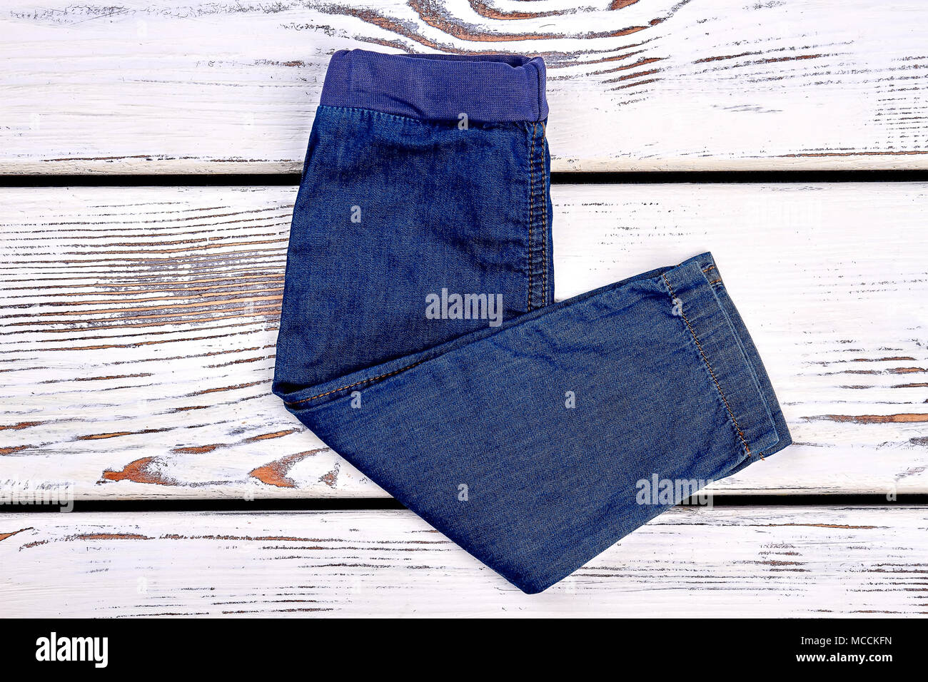 Kids new folded jean trousers. Baby high quality jeans on sale. Kids  boutique clothes. Casual kids denim Stock Photo - Alamy
