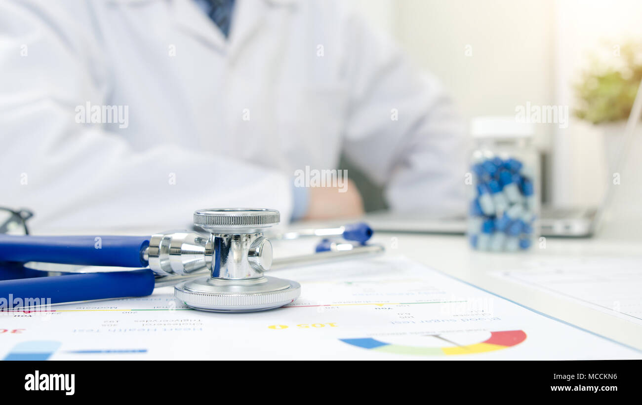 Stethoscope on desk. Doctor working in hospital. Healthcare and medical concept. Stock Photo