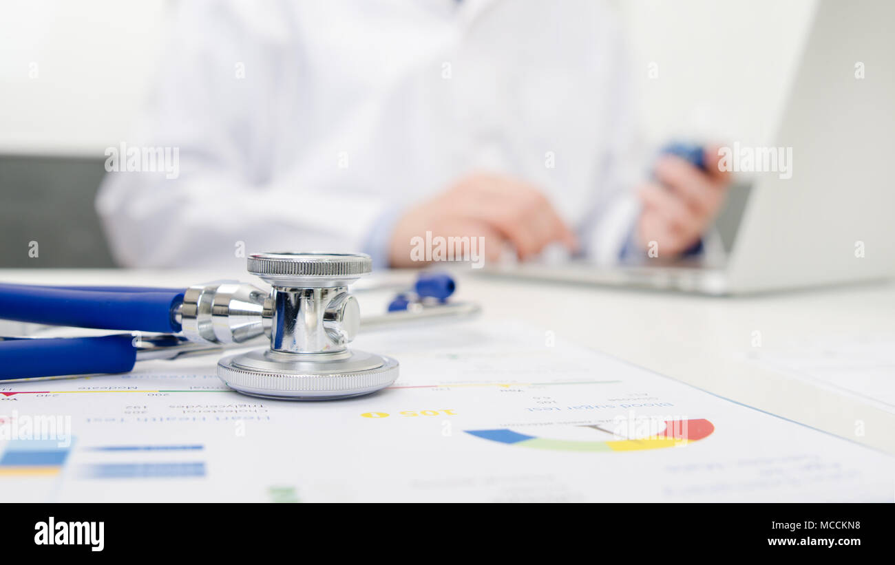 Stethoscope on desk. Doctor working in hospital. Healthcare and medical concept. Stock Photo