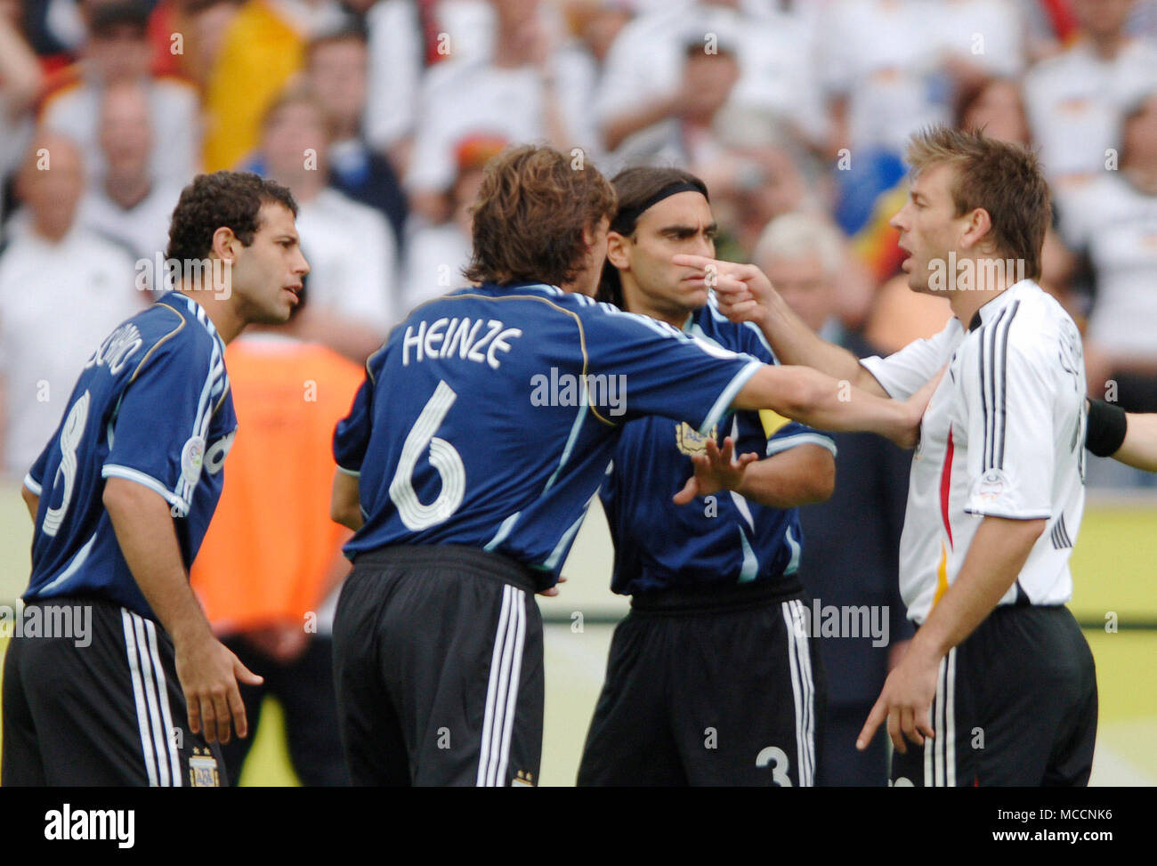 Olympiastadion  Berlin Germany, 30.6.2006, FIFA World Cup Quarter-Finals, Germany vs Argentina 4:2 after penalties --- from left: Maxi RODRIGUEZ (ARG), Gabriel HEINZE (ARG), Juan SORIN (ARG) and Bernd SCHNEIDER (GER) fight after the match Stock Photo