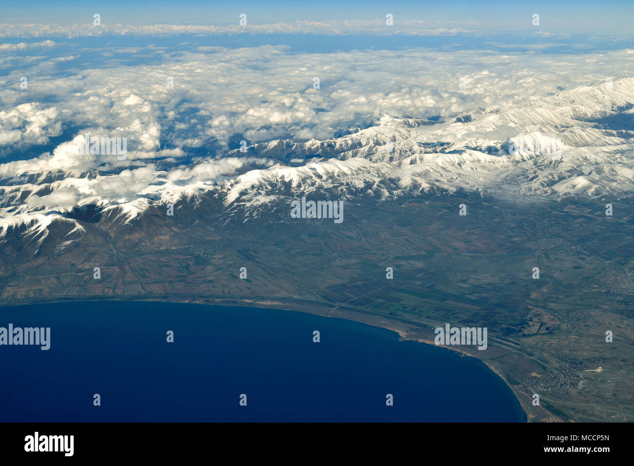 Lake Sevan and Caucasus Mountains Stock Photo