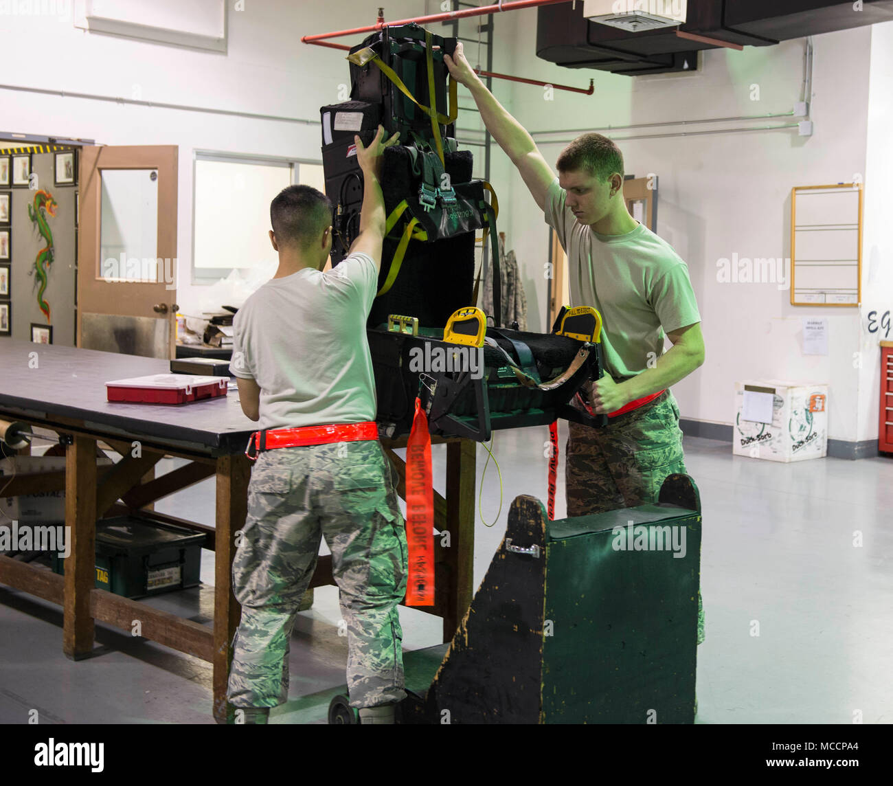Airmen from the 18th Component Maintenance Squadron egress shop prepare ...