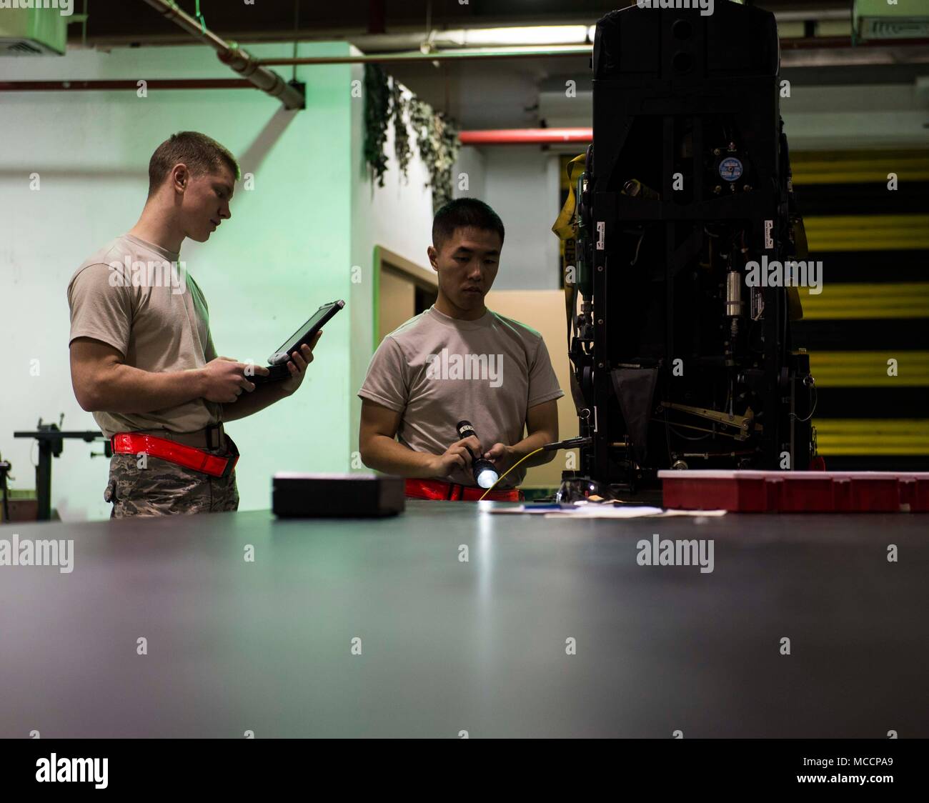 Airmen from the 18th Component Maintenance Squadron egress shop perform ...