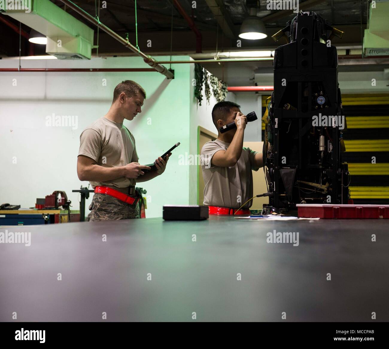 Airmen from the 18th Component Maintenance Squadron egress shop perform ...