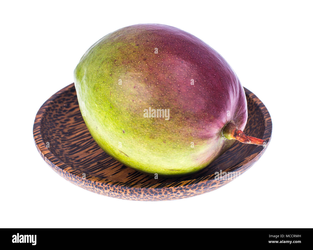 Cut mango on plate Cut Out Stock Images & Pictures - Alamy