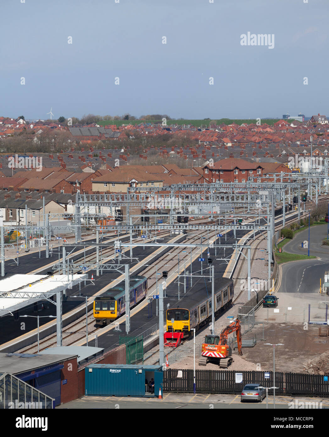 14/4/18 2 Northern Rail trains in the rebuilt and electrified Blackpool North station with driver training runs before passenger services returned Stock Photo