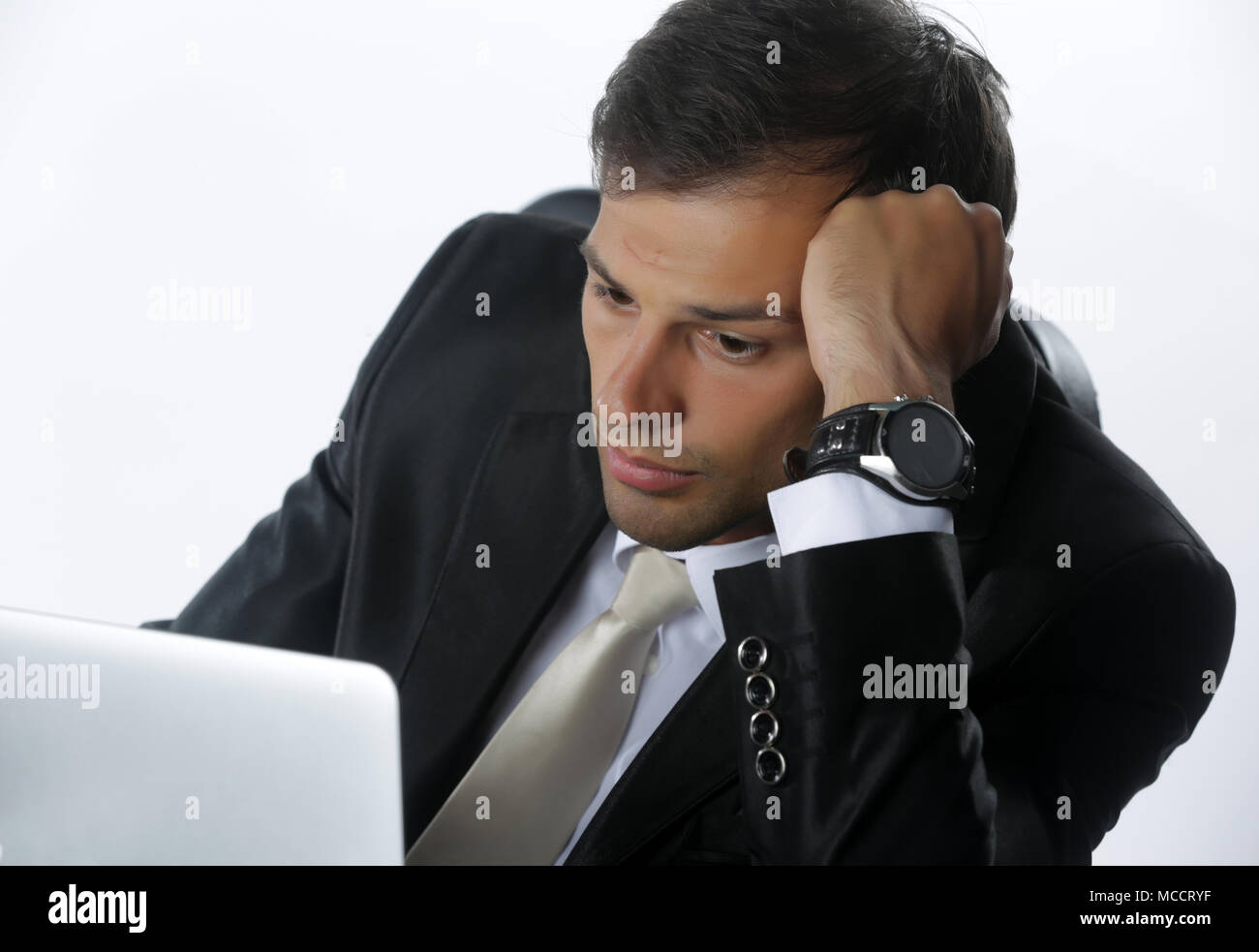 frustrated business man working on laptop computer at office Stock ...