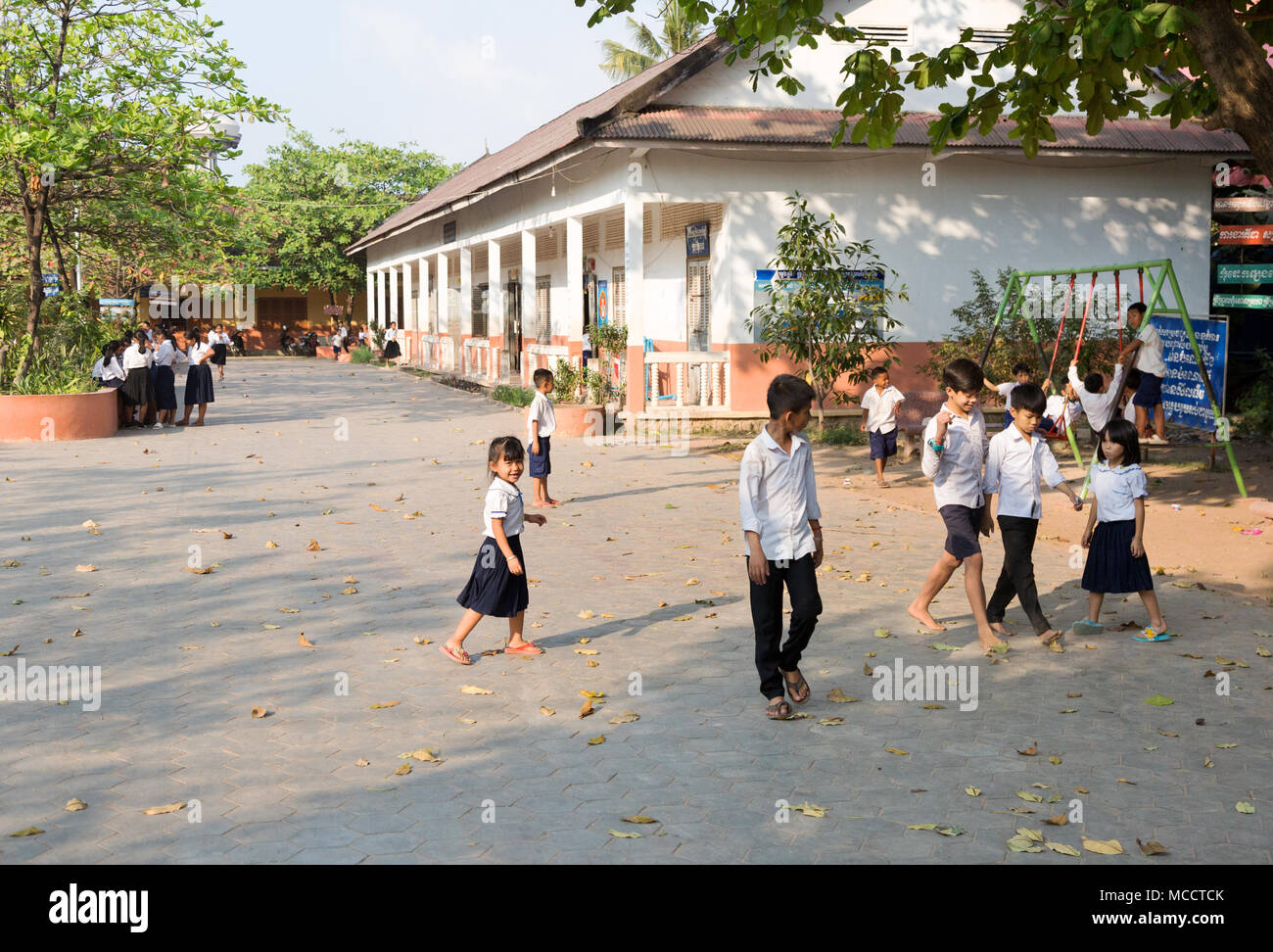 Asia school children - Cambodian primary school children in school playground, Siem Reap, Cambodia, Asia Stock Photo