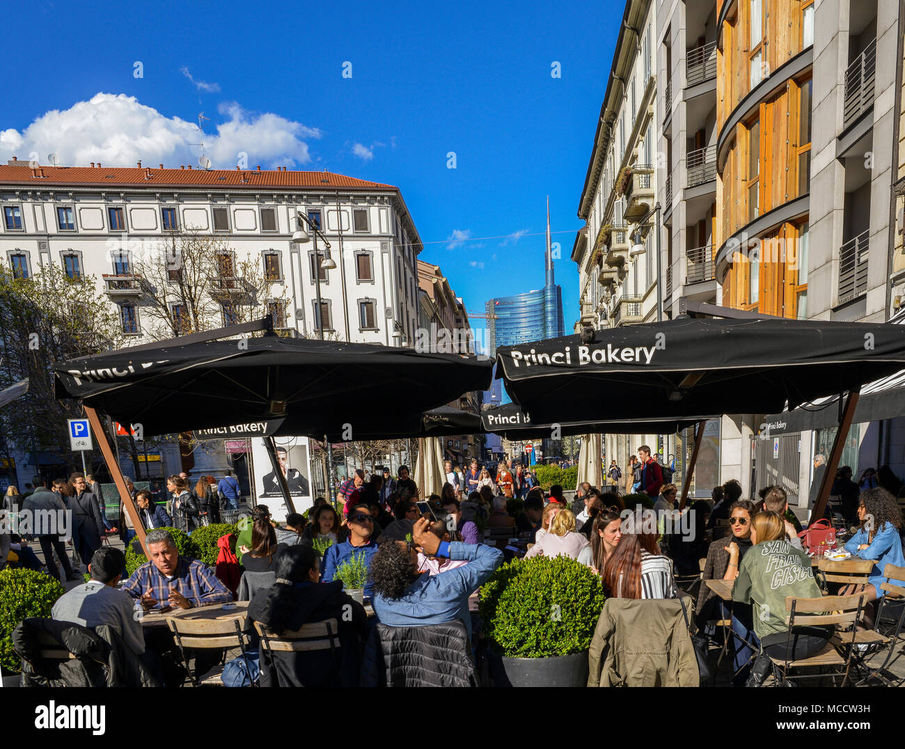Milan, Italy - April 1st, 2018: A crowded cafe on Corso Garibaldi, one of Milan's most fashionable streets Stock Photo