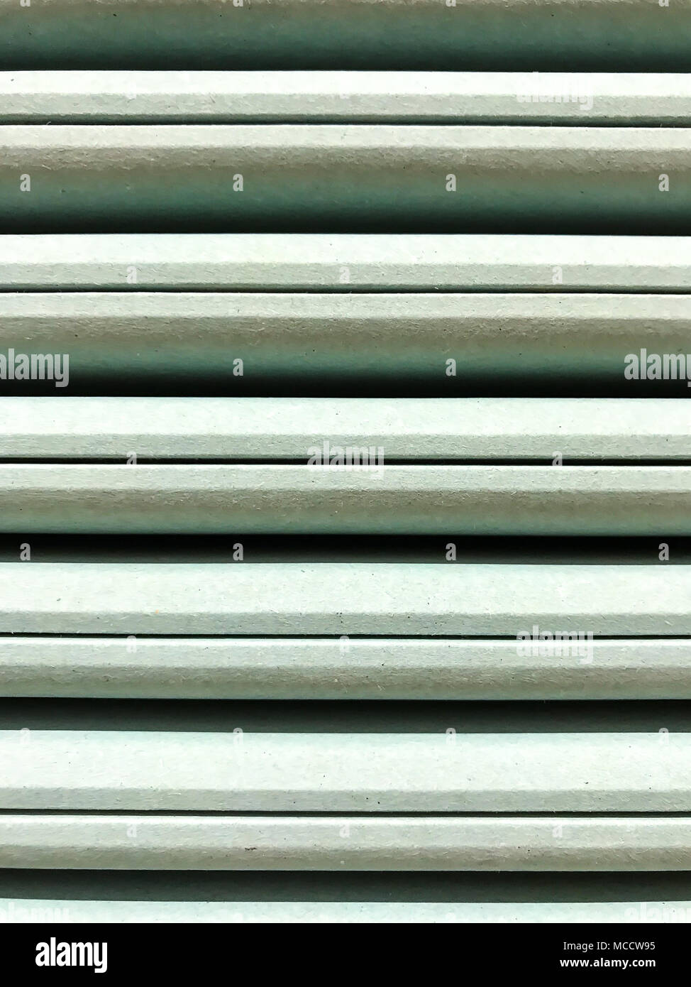 Texture, structure of the gypsum board stack. Studio Photo Stock Photo