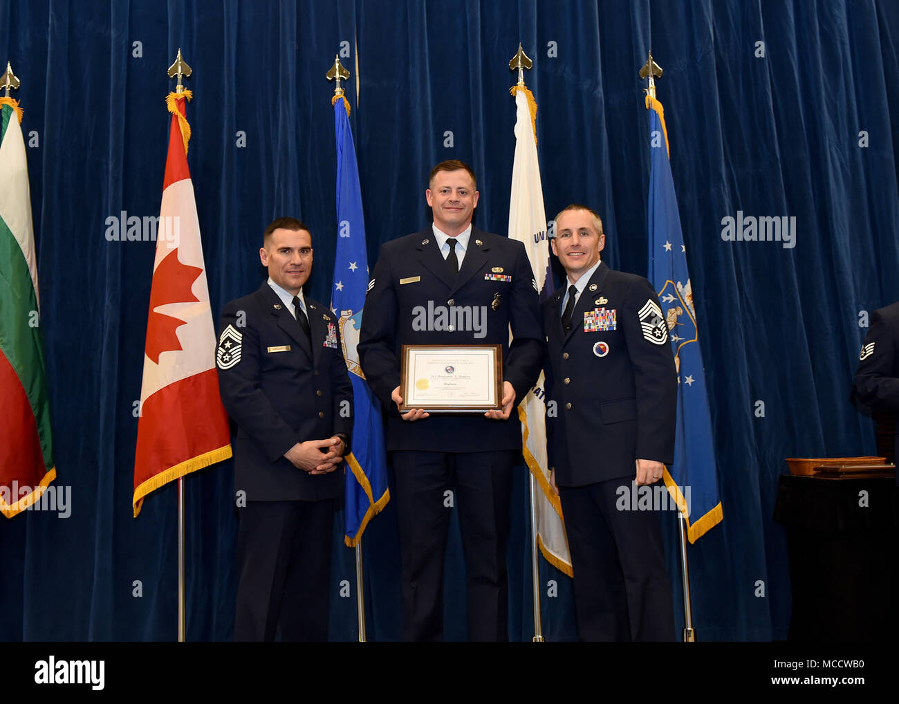 Senior Airman Ben Slenker from Rosecrans Air National Guard Base, Mo., takes the Distinguished Graduate Award in Airman Leadership School BLC 18-3 at the Chief Master Sgt. Paul H. Lankford Enlisted Professional Military Education Center on McGhee Tyson Air National Guard Base in East Tennessee, Feb. 8, 2018, during the graduation ceremony. (U.S. Air National Guard photo/Master Sgt. Mike R. Smith) Stock Photo