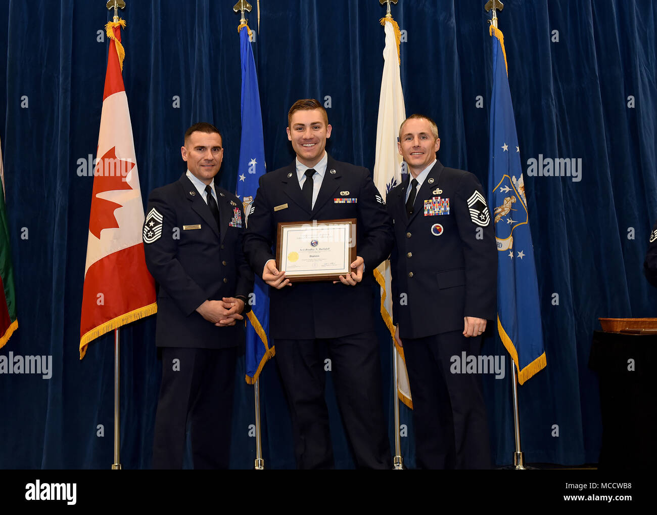 Senior Airman Bradley Barkdoll from Harrisburg Air National Guard Base, Pa., takes the Distinguished Graduate Award in Airman Leadership School BLC 18-3 at the Chief Master Sgt. Paul H. Lankford Enlisted Professional Military Education Center on McGhee Tyson Air National Guard Base in East Tennessee, Feb. 8, 2018, during the graduation ceremony. (U.S. Air National Guard photo/Master Sgt. Mike R. Smith) Stock Photo