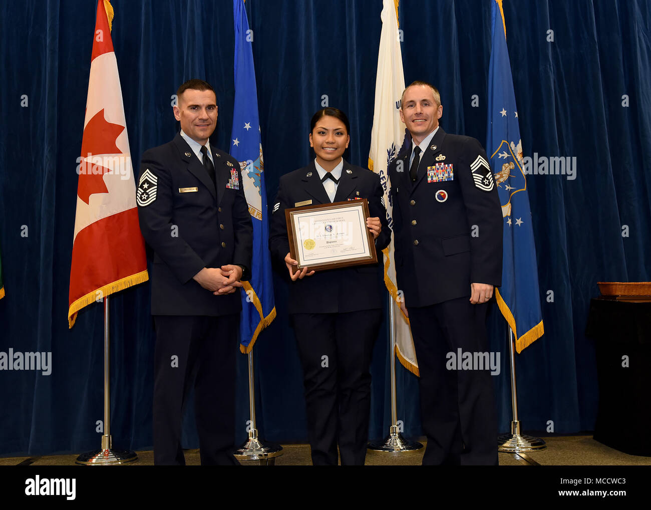 Senior Airman Monica Armea from Fort Peoria Air National Guard Base, Ill., takes the Distinguished Graduate Award in Airman Leadership School 18-4 at the Chief Master Sgt. Paul H. Lankford Enlisted Professional Military Education Center on McGhee Tyson Air National Guard Base in East Tennessee, Feb. 8, 2018, during the graduation ceremony. (U.S. Air National Guard photo/Master Sgt. Mike R. Smith) Stock Photo