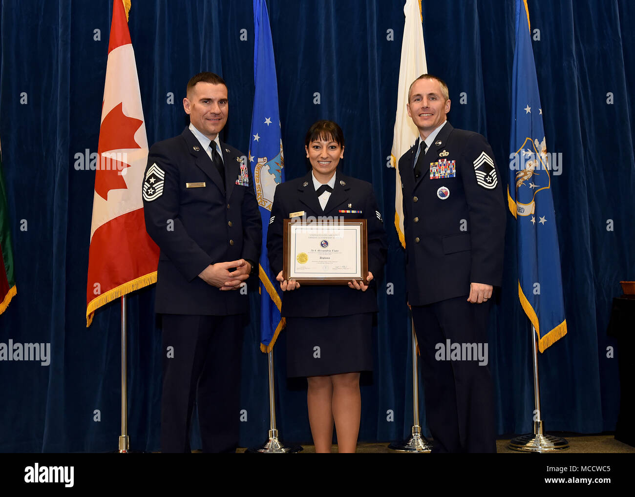 Senior Airman Alexandria Fiato from Fort Wayne Air National Guard Station, Ind., takes the Distinguished Graduate Award in Airman Leadership School 18-4 at the Chief Master Sgt. Paul H. Lankford Enlisted Professional Military Education Center on McGhee Tyson Air National Guard Base in East Tennessee, Feb. 8, 2018, during the graduation ceremony. (U.S. Air National Guard photo/Master Sgt. Mike R. Smith) Stock Photo