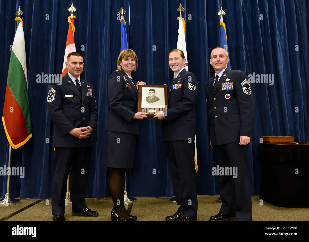 Tech. Sgt. Jacqueline Risley from Seymour Johnson Air Force Base, N.C., takes the John L. Levitow Award in NCO Academy 18-2 at the Chief Master Sgt. Paul H. Lankford Enlisted Professional Military Education Center on McGhee Tyson Air National Guard Base in East Tennessee, Feb. 8, 2018, during the graduation ceremony. (U.S. Air National Guard photo/Master Sgt. Mike R. Smith) Stock Photo