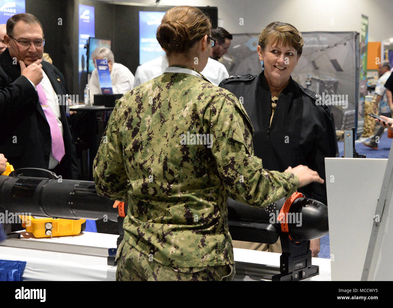 180208-N-UN340-002 SAN DIEGO (Feb. 8, 2018) U.S. Navy Vice Adm. Jan Tighe, Deputy Chief of Naval Operations for Information Warfare and Director of Naval Intelligence (N2N6), receives a brief on underwater sensors from Aerographer’s Mate 2nd Class Deserae Laczniak, assigned to Naval Oceanography Special Warfare Center, while touring the U.S. Navy Information Warfare (IW) pavilion at the WEST 2018 conference. The IW pavilion demonstrates the Navy's commitment to warfighting in the information age through the use of speakers, panels, subject matter experts and capability displays from organizati Stock Photo