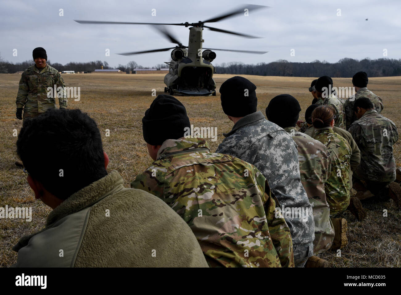 Soldiers with the 101st Combat Aviation Brigade, 101st Airborne Division (Air Assault) load equipment into a CH-47 Chinook helicopter in preparation to jump their tactical operations center (TOC) to a new location during Warfighter, a two-week command and control exercise February 13, 2017 at Ft. Campbell, Ky. (U.S. Army photo taken by Sgt. Marcus Floyd, 101st Combat Aviation Brigade) Stock Photo