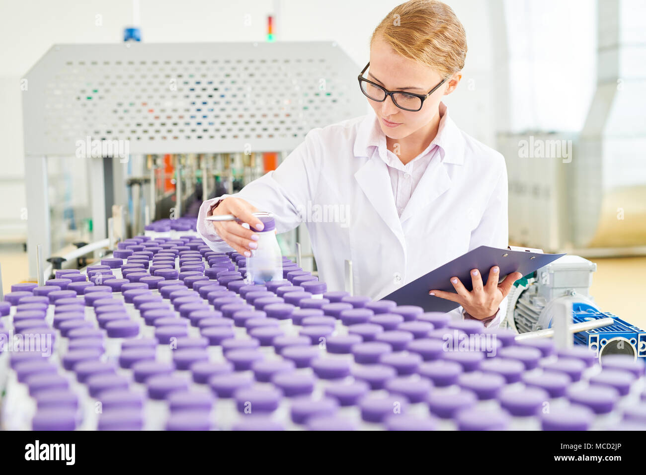 Checking Quality of Soy Milk Stock Photo