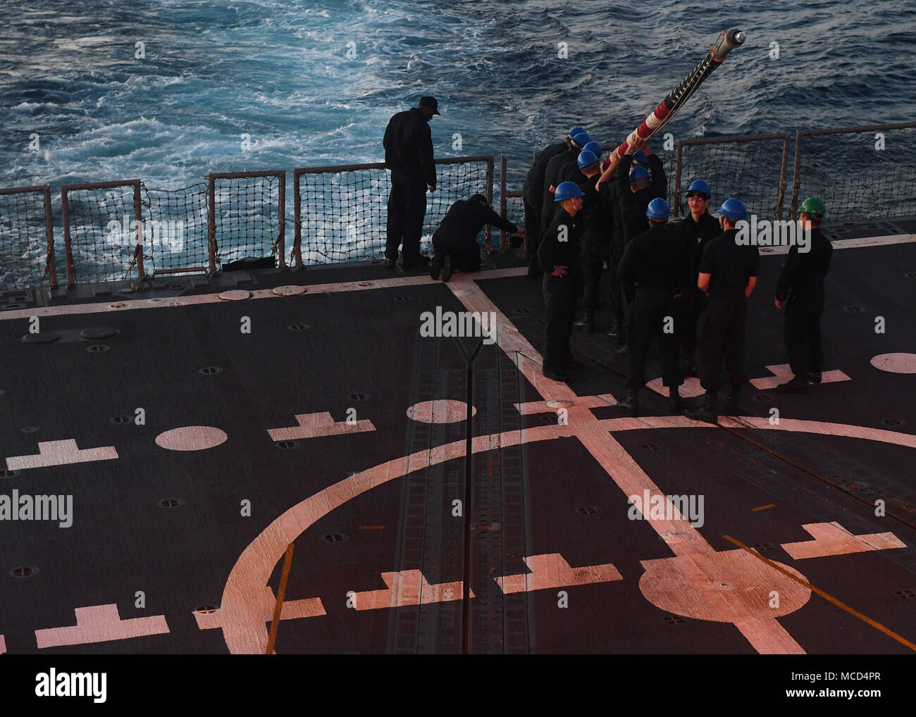 180216-N-FN963-0033 PEARL HARBOR (Feb. 16, 2018) Sailors hoist the ...
