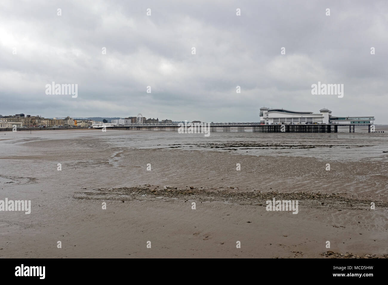 Weston-super-Mare, UK. 16th April, 2018. UK weather: an almost deserted beach on an overcast, breezy, showery spring afternoon. Keith Ramsey/Alamy Live News Stock Photo