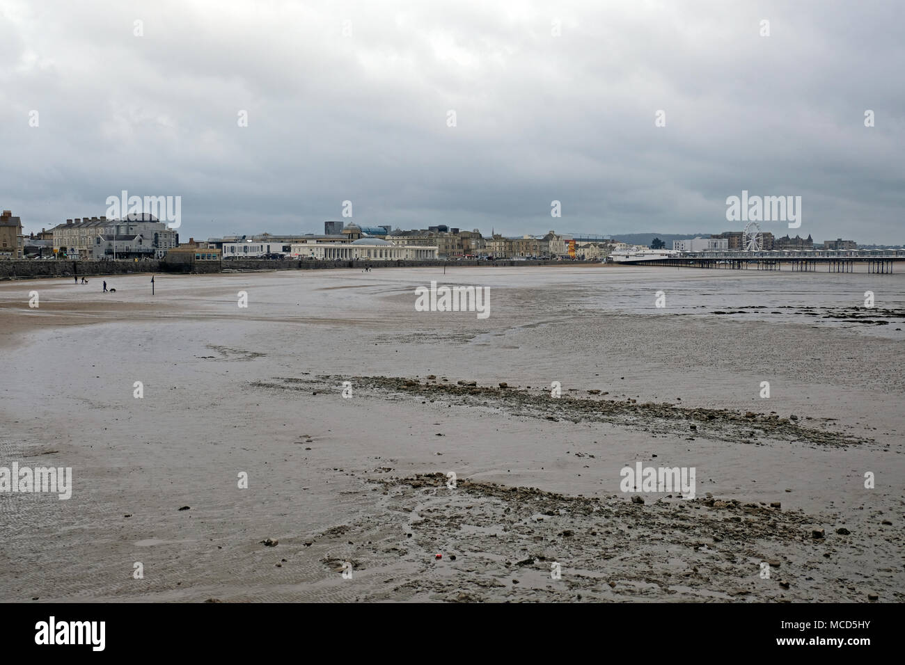 Weston-super-Mare, UK. 16th April, 2018. UK weather: an almost deserted beach on an overcast, breezy, showery spring afternoon. Keith Ramsey/Alamy Live News Stock Photo