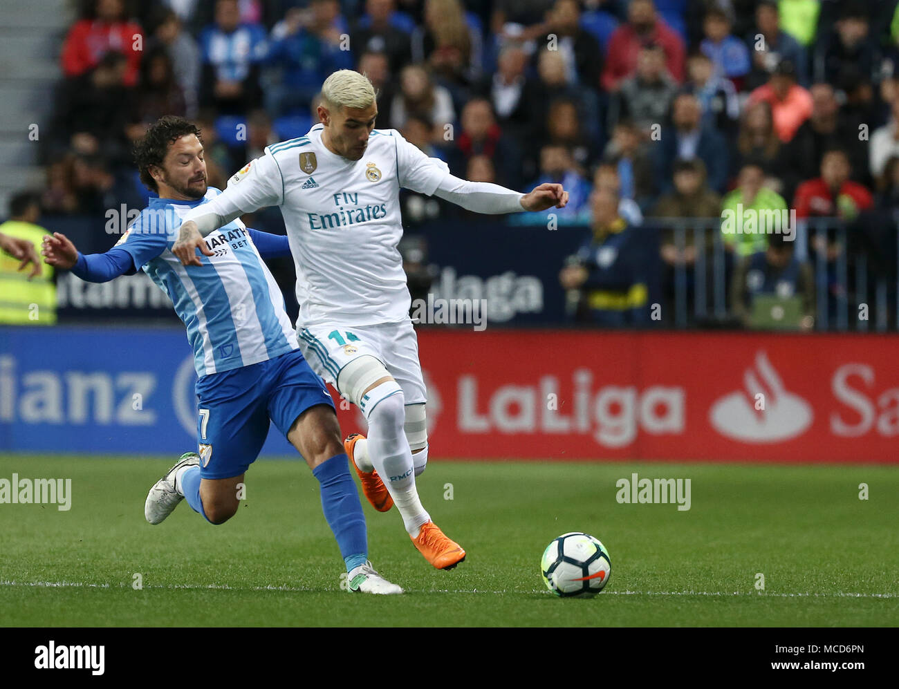 Theo Hernandez Real Madrid Competes For The Ball With Iturra Malaga Cf During The La Liga Match Between Malaga Cf And Real Madrid Cf At Estadio La Rosaleda Final Score Malaga 1 Theo Hernandez Real Madrid Competes For The Ball With Iturra Malaga Cf During The La Liga Match Between Malaga Cf And Real Madrid Cf At Estadio La Rosaleda Final Score Malaga 1
