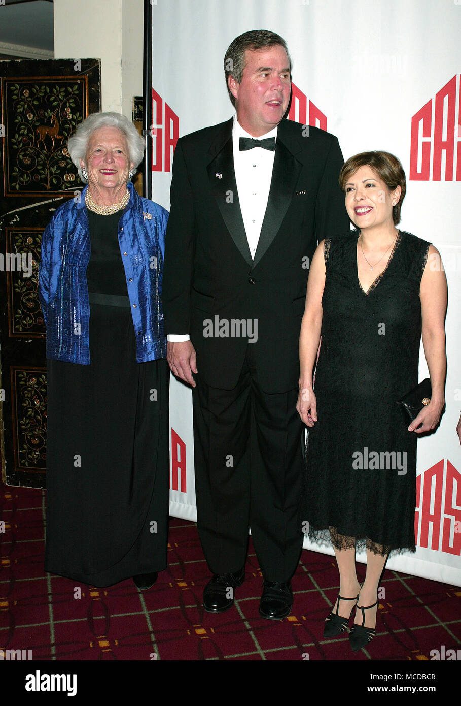 Barbara Bush with son Governor Jeb Bush and his wife Columbia Bush attend CASA'S Eleventh Anniversary Awards Dinner Honors American Leadership in Combating Substance Abuse. Waldorf Astoria Hotel, NYC. April 2, 2003 Credit: Walter McBride/MediaPunch Stock Photo